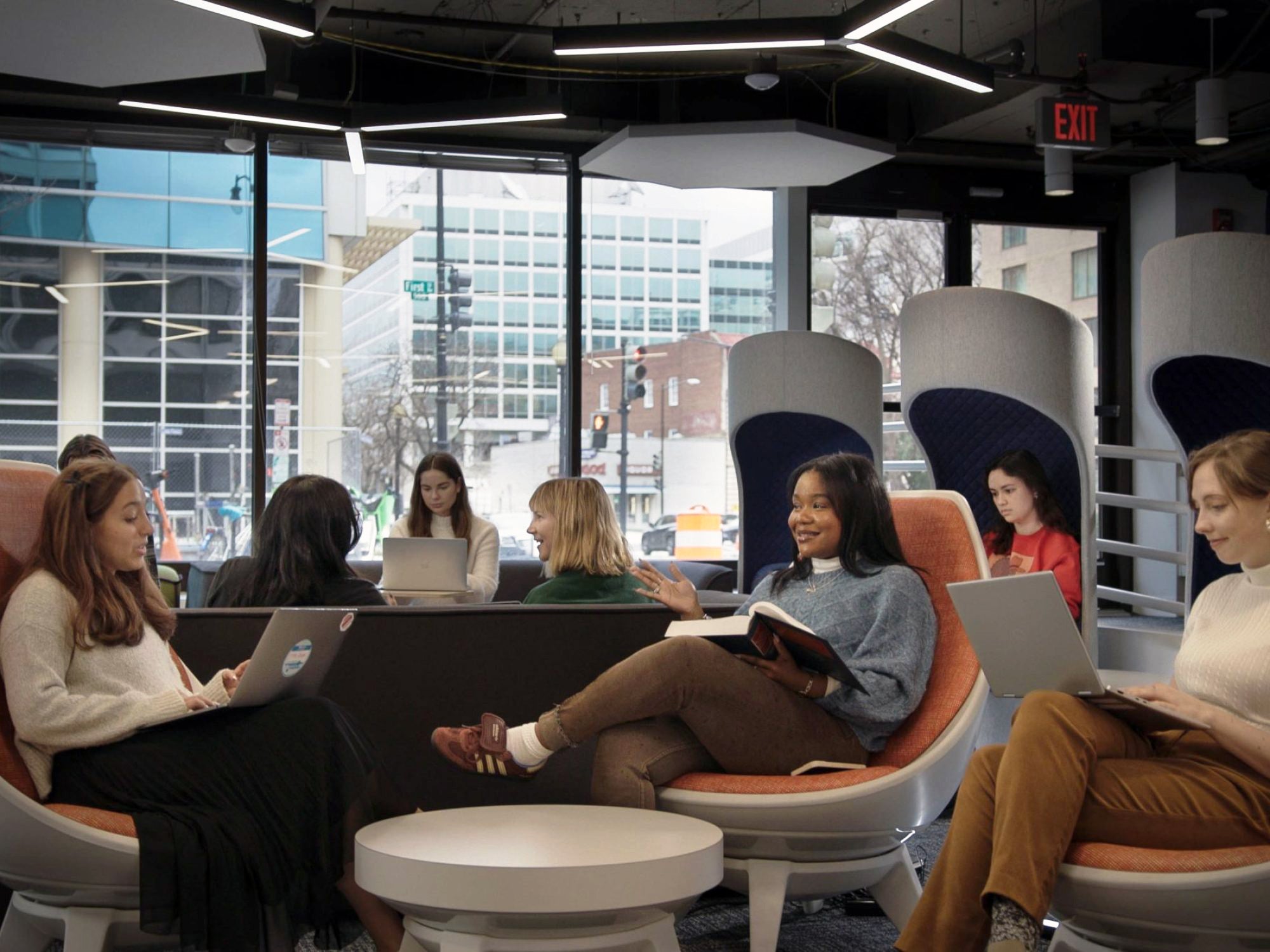 Students sitting in chairs downtown at the Capitol Campus